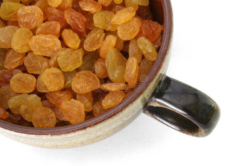 Cup full of raisins stock image. Image of yellow, yummy 1431967