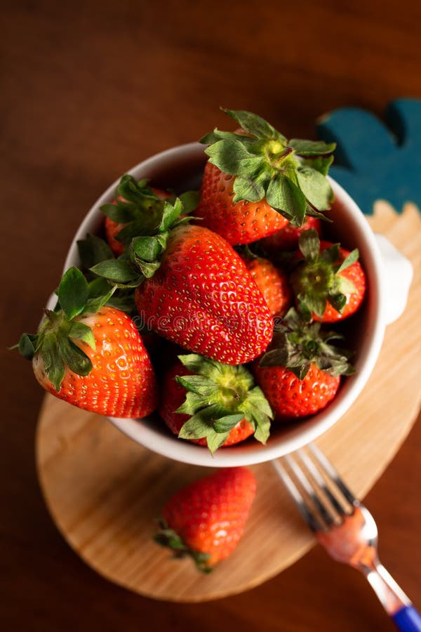 A cup full of strawberries