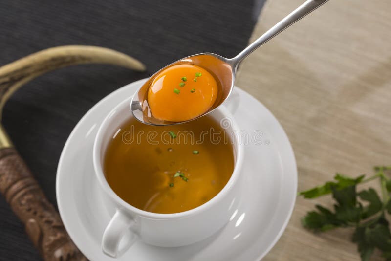 A Cup of Hot Broth, with Noodles, and Vegetables Decorated for G Stock