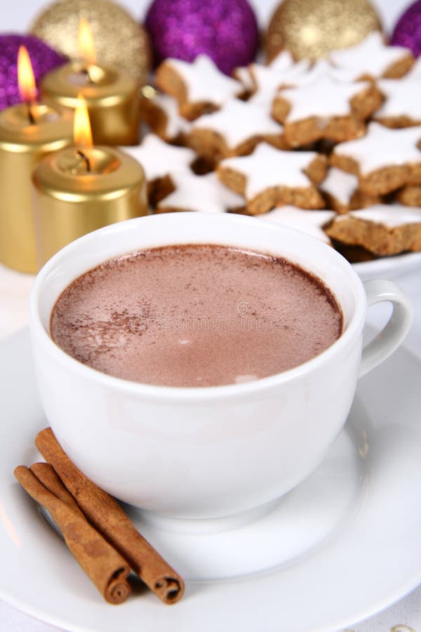Cup of hot chocolate and christmas cookies