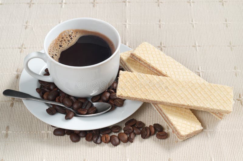 Coffee and tasty wafers stock image. Image of delicious - 124960423