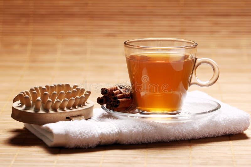 Cup of hot tea on the towel