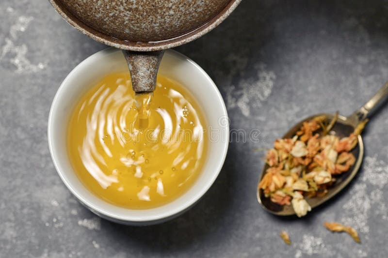 Cup of Jasmine Tea with Dried Flowers Stock Image Image of water