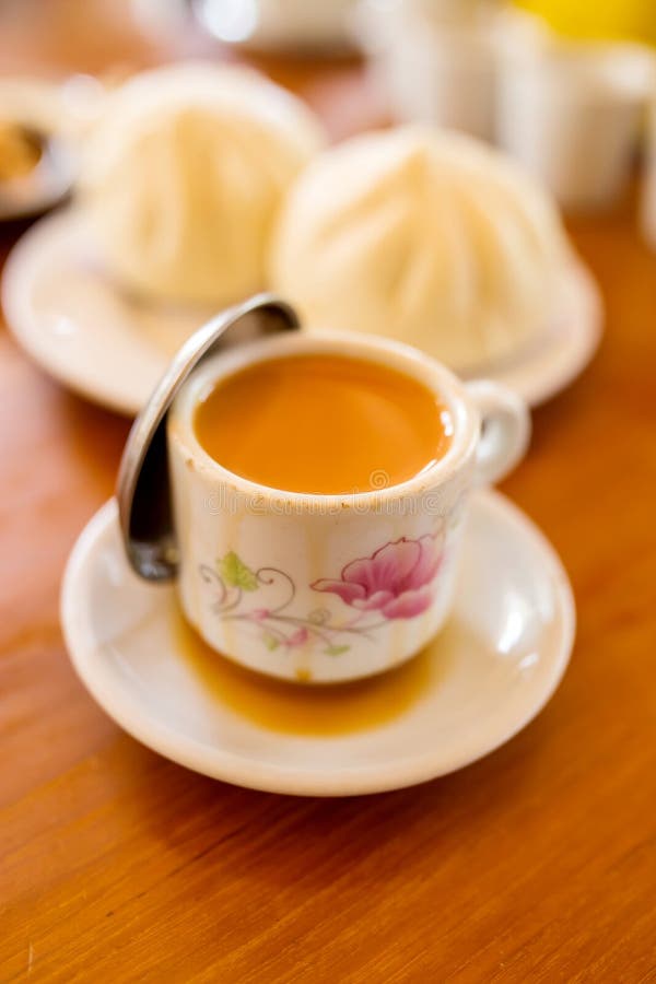 Cup of Milk Tea and Steamed Bun Stock Photo Image of beverage, water