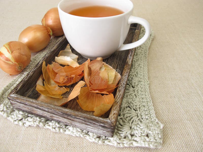 A cup of onion peel tea stock photo. Image of system 237768118