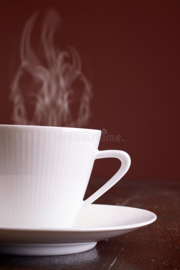 Cup of steaming hot coffee