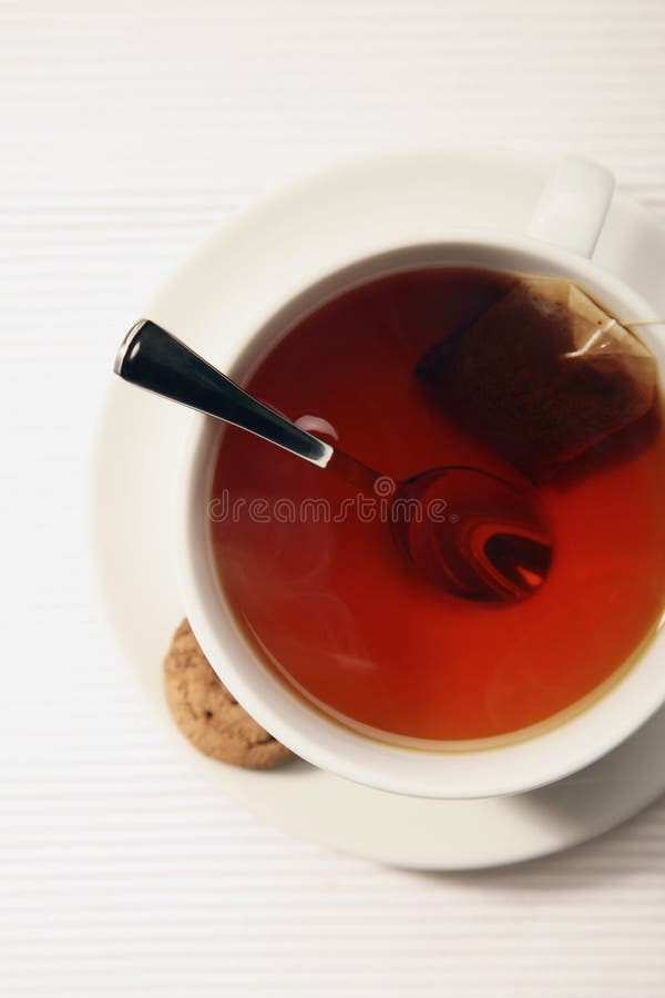 A Cup of Tea with Biscuit at the Side. Conceptual Image Stock Photo