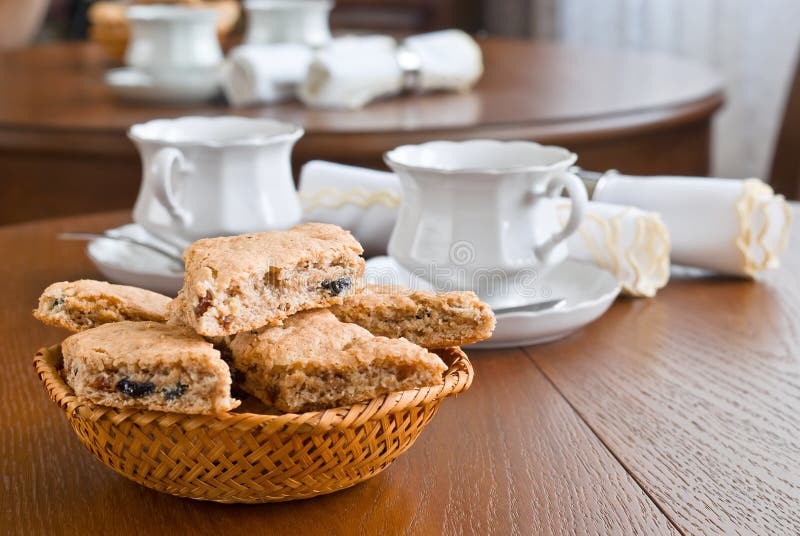 A cup of tea and biscuits stock photo. Image of home 20125898