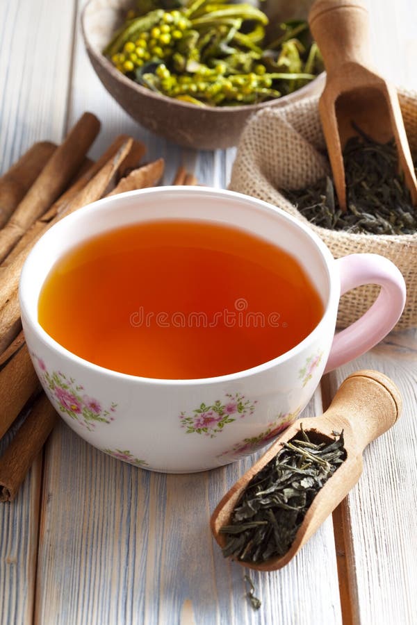 Cup of Tea and Dried Tea Leaves Stock Photo Image of food