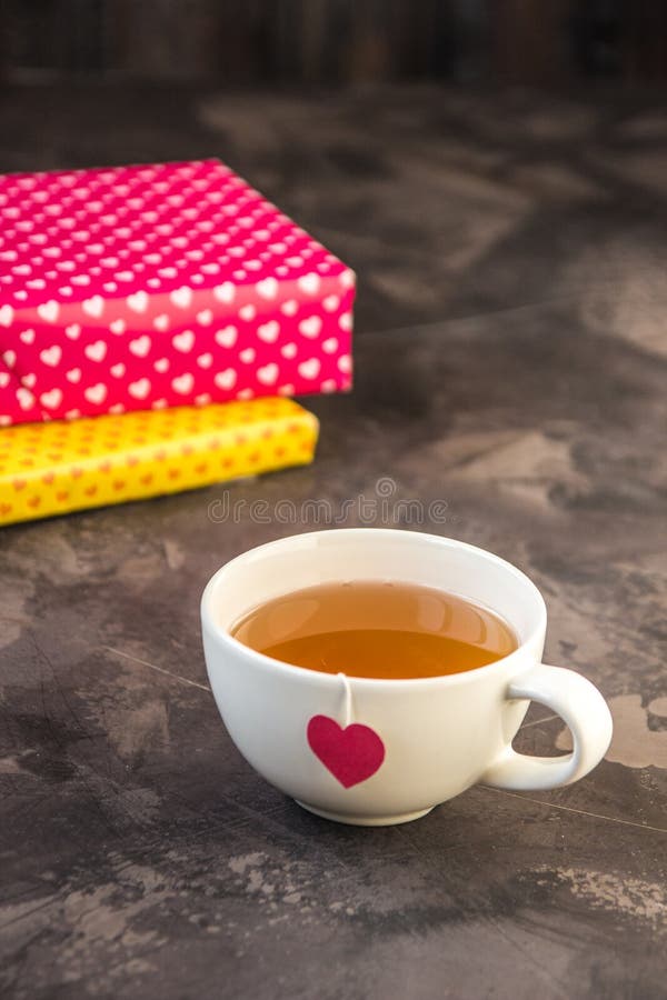 Cup of Tea with Heart Teabag and Gift Boxes Stock Image Image of