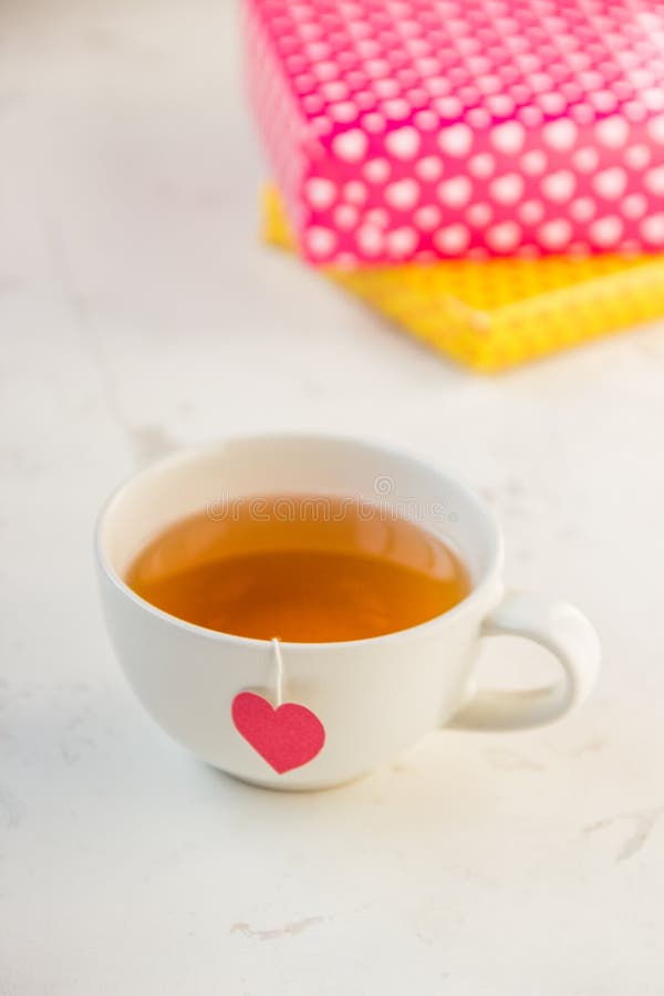Cup of Tea with Heart Teabag and Gift Boxes Stock Image Image of