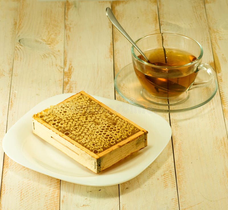 Cup of Tea and Honeycomb on a Plate Stock Image - Image of calories