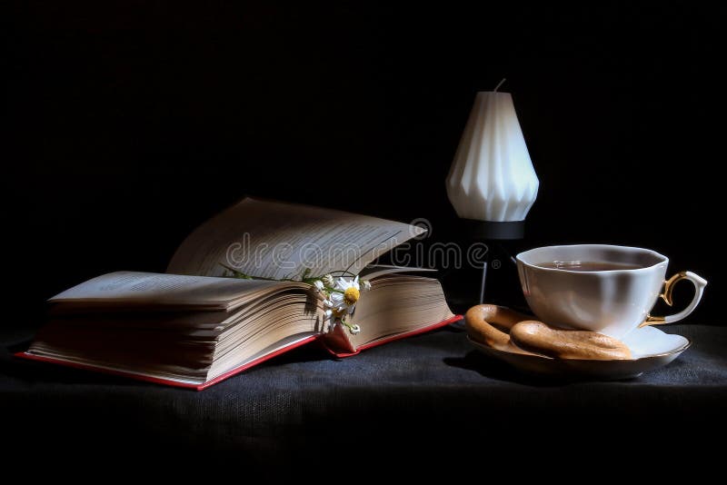 Cup of Tea with Open Book and Candle Close Up, Black Background. Autumn Concept. Picture of Wallpaper Stock Image - Image of antique, life: 155406009 Cup of Tea with Open Book and Candle Close Up, Black Background. Autumn Concept. Picture of Wallpaper Stock Image - Image of antique, life: 155406009