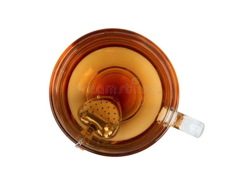 Cup of tea and strainer stock image. Image of metallic 85957913