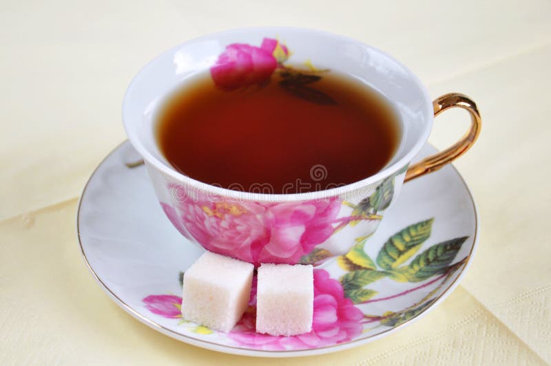 A cup of tea and sugar stock photo. Image of drink, ornament 19257130