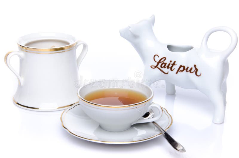 A Cup Of Tea With Sugar And A Milk Jug Stock Photo Image of drink, green 40446306