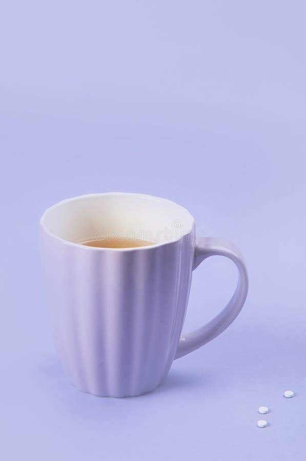 A Cup of Tea with Sweetener. a Cup of Tea with Sugar Stock Image