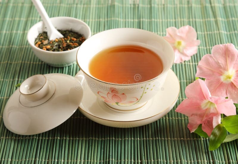 A cup of tea on the table stock images
