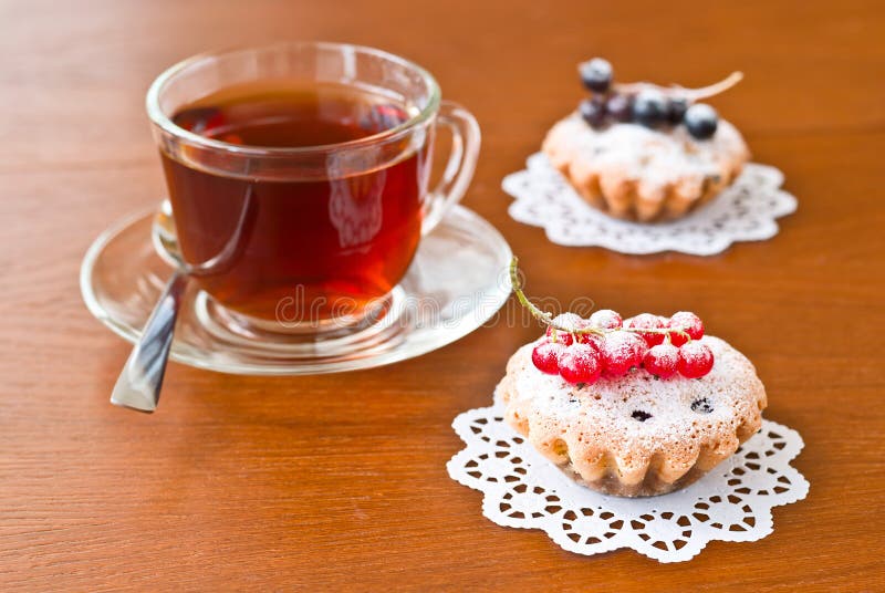 Tea For Two And A Piece Of Cake A cup of tea and two cake stock image. Image of paper - 22212167