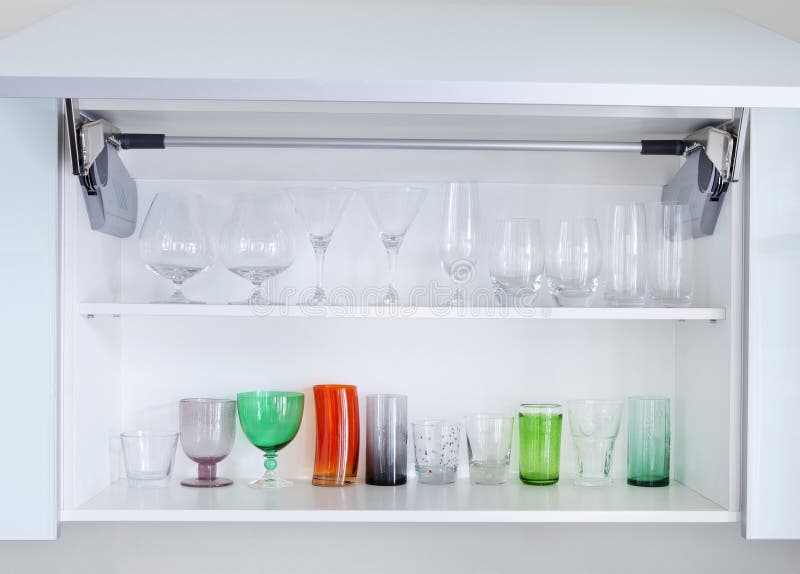 Cupboard with glasses stock photo. Image of kitchen, transparent 38955204