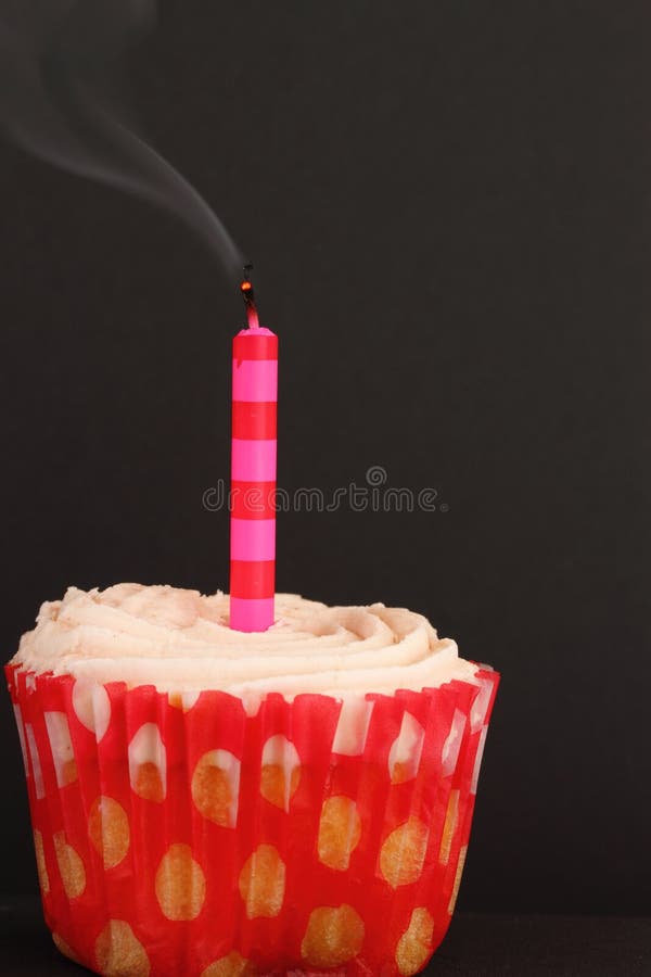 Cupcake With Blown Out Burning Candles On Top Stock Image Image of