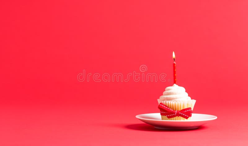 Cupcake met het thema van de kaarspartij stock foto Cupcake met het thema van de kaarspartij stock foto