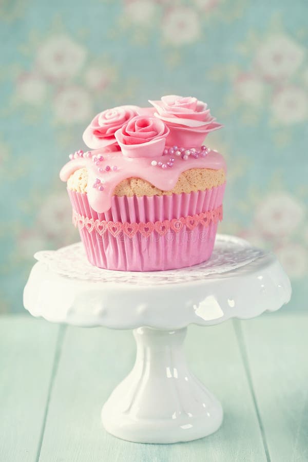 Cupcake with pink flowers stock image. Image of traditional - 30851417