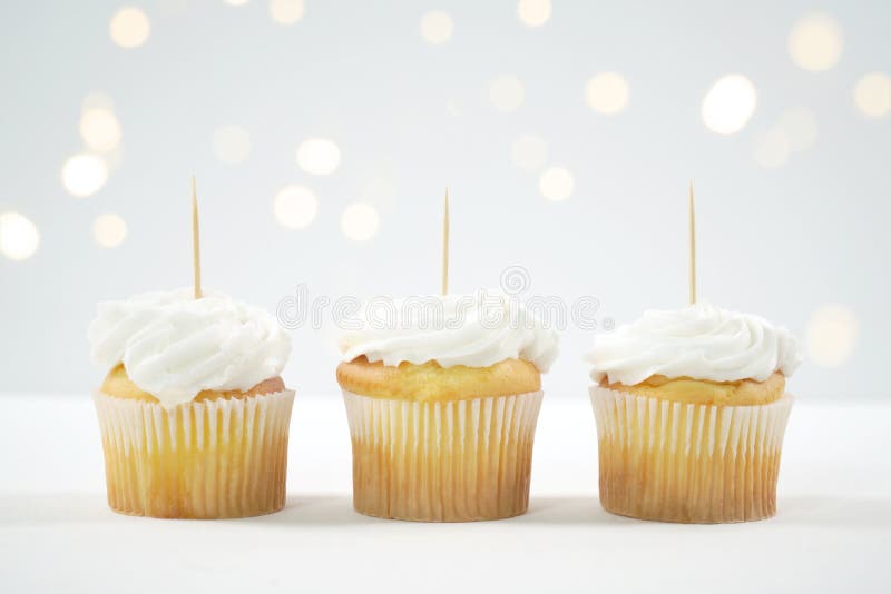 Cupcake Topper Mockup. White background with bokeh party fairy lights.