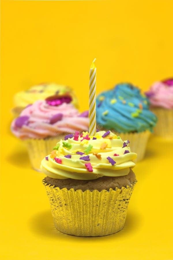 Cupcake on yellow stock photo. Image of single, muffin 11691064