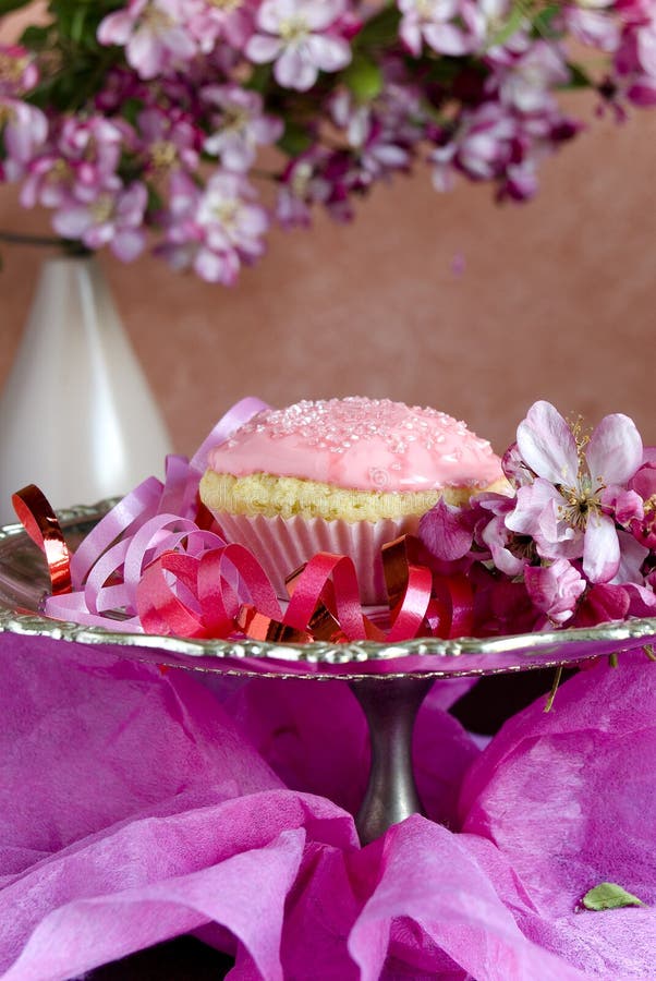 Pink Cupcake in a Teacup stock photo. Image of dessert 10852532