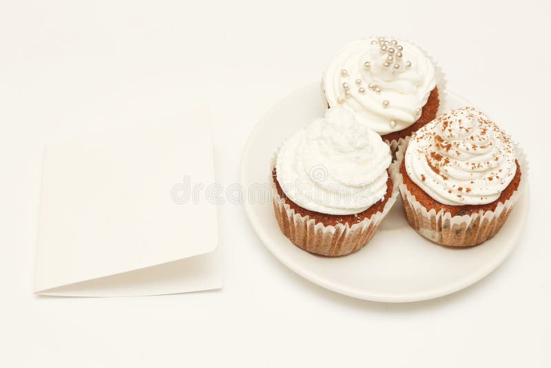 Cupcakes with blank card royalty free stock photo