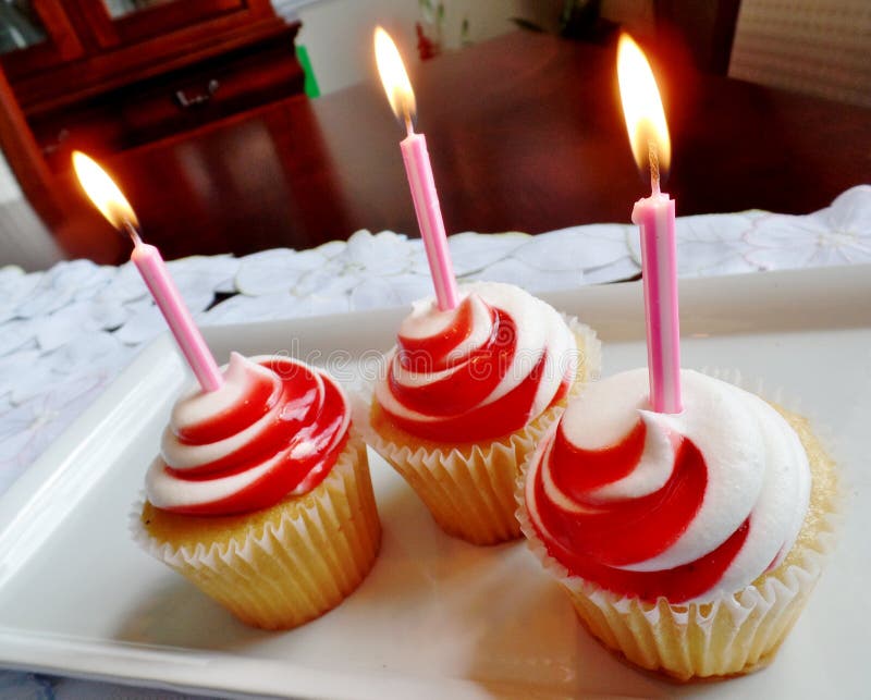 Cupcakes with candles stock image. Image of cupcakes 60036259