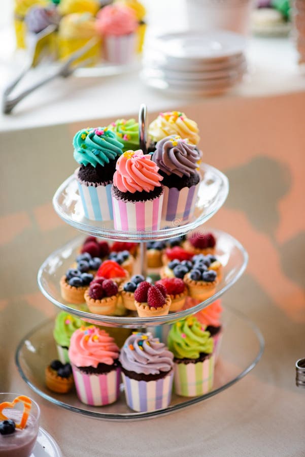 Cupcakes and fruit tarts stock image. Image of jelly 46791409