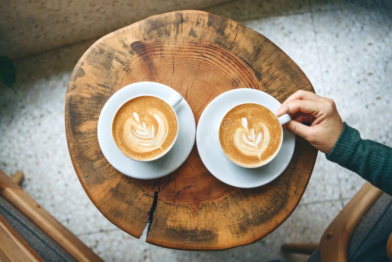 Cups of aromatic coffee cappuccino