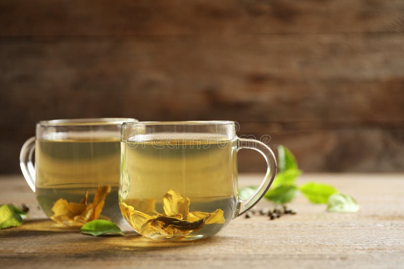 Cups of Green Tea and Leaves on Wooden Table Stock Photo Image of