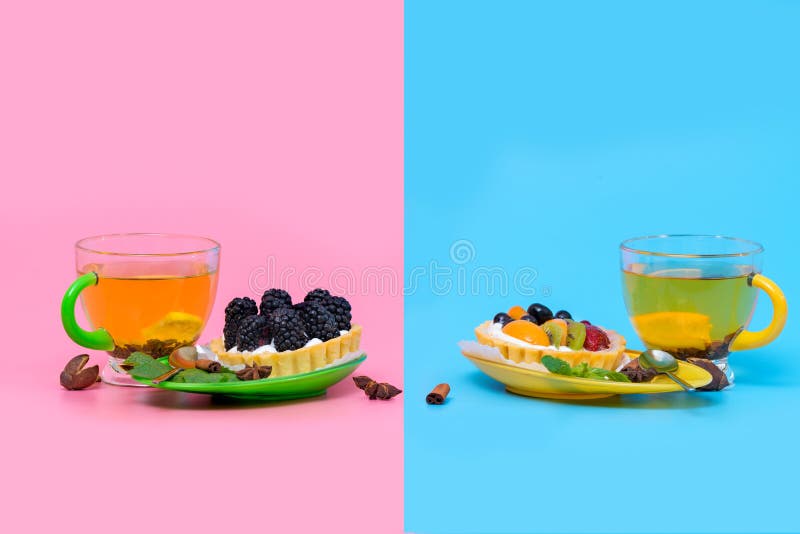 Cups of hot spicy lemon tea with fruit pastries royalty free stock photos Cups of hot spicy lemon tea with fruit pastries royalty free stock photos
