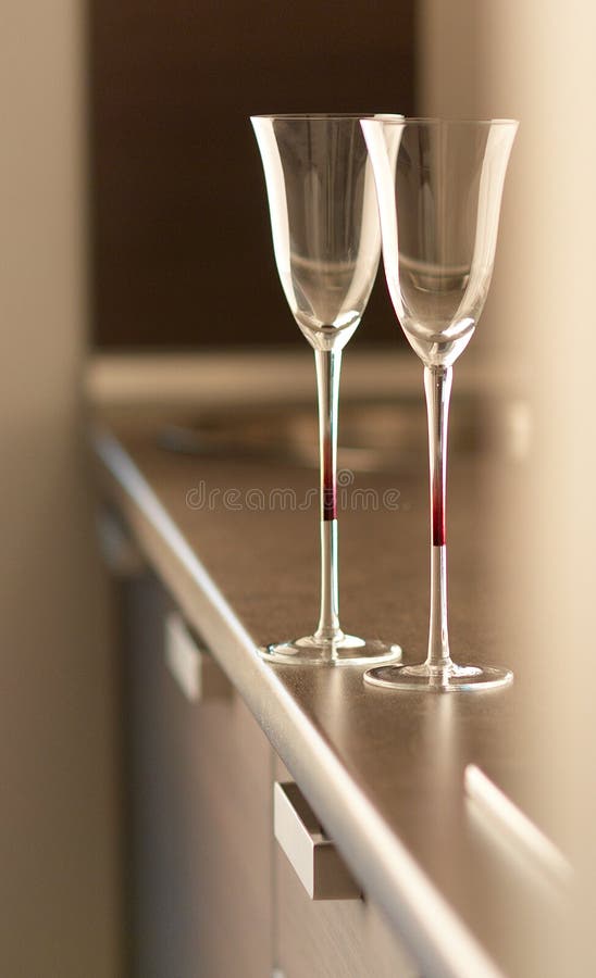 Cups on table in modern kitchen