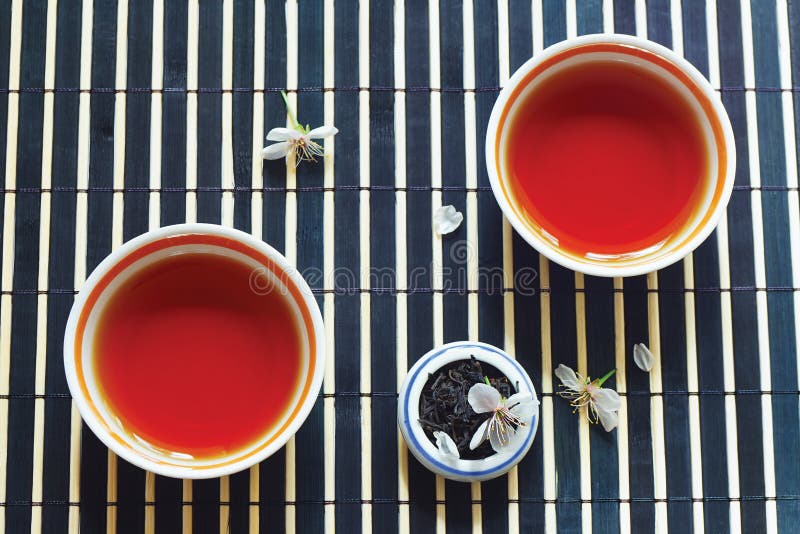 Cups of Tea, Jar of Tea Leaves and Cherry Blossoms Stock Photo Image of assam, asia 24729804