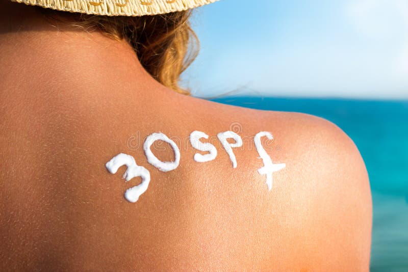 Cura di pelle e protezione del sole fotografia stock Cura di pelle e protezione del sole fotografia stock