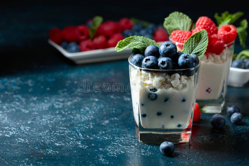 Curd dessert with berries and mint