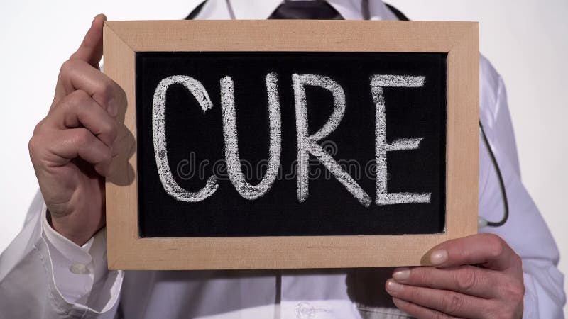 Curi scritto sulla lavagna in mani del terapista, metodo di trattamento innovatore fotografia stock libera da diritti Curi scritto sulla lavagna in mani del terapista, metodo di trattamento innovatore fotografia stock libera da diritti