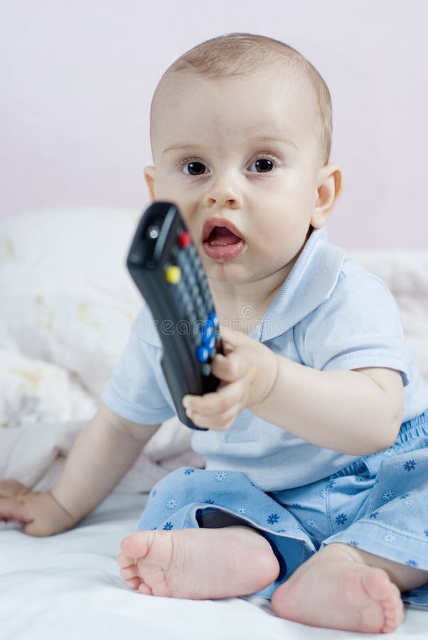 Curious baby girl zipping royalty free stock photos