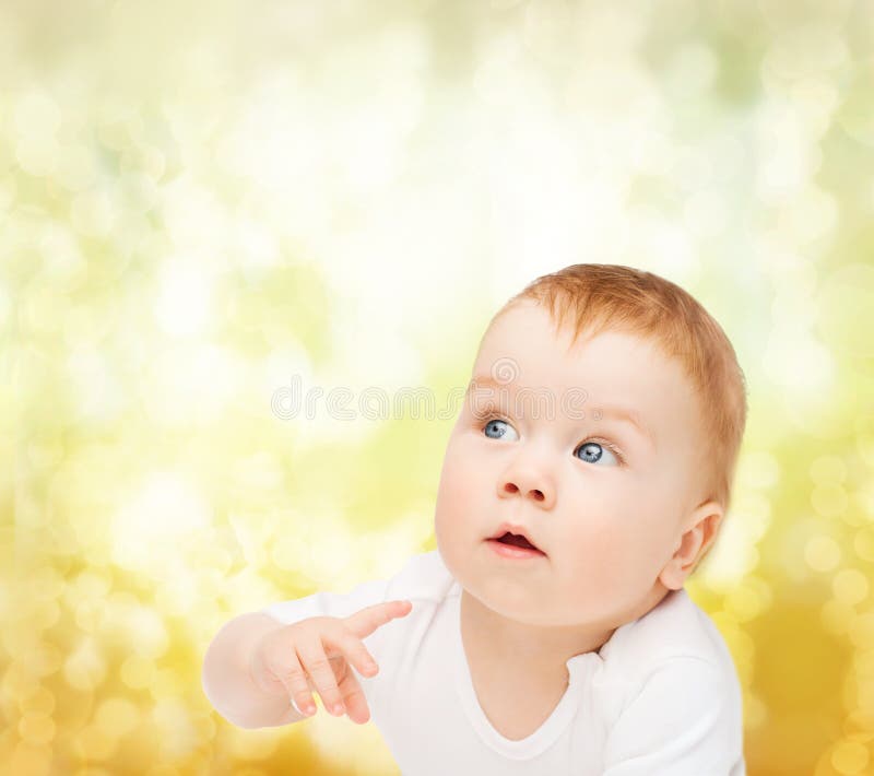Curious baby looking side royalty free stock images