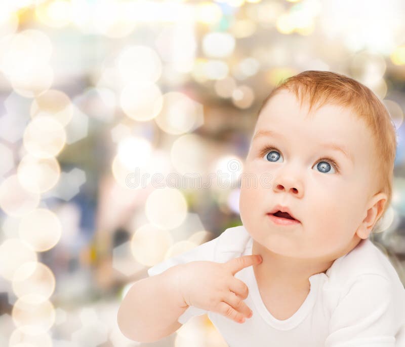 Curious baby looking up stock photo. Image of cute, healthcare 43403402