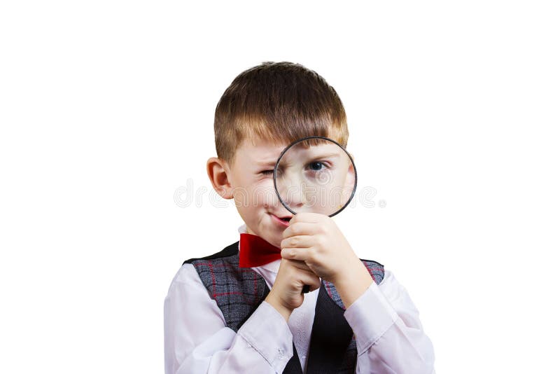 Curious Exploring little boy with magnifying glass royalty free stock photo Curious Exploring little boy with magnifying glass royalty free stock photo
