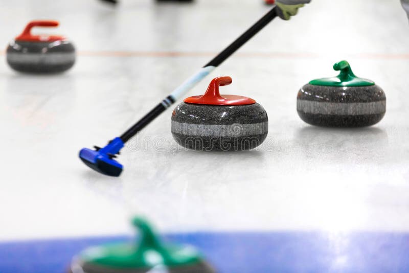 Curling Stones and Broom on the Ice Stock Image Image of white