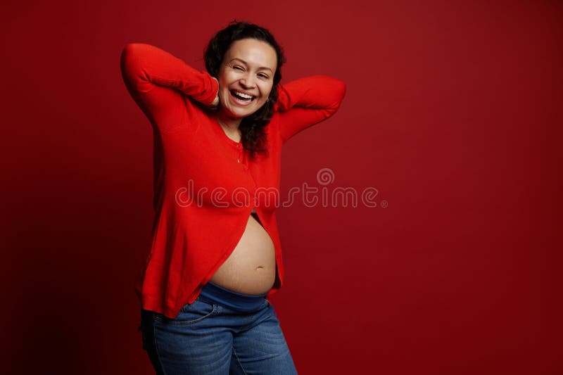 Curly Ethnic Pregnant Adult Woman Laughing, Posing Bare Belly Over