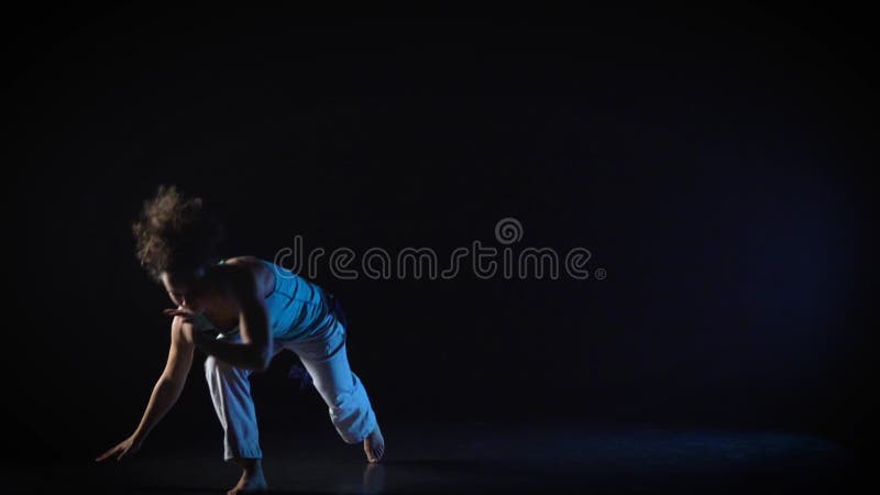 Serious Maiden Performing Incredibly Complex of Martial Art of Capoeira Serious Maiden Performing Incredibly Complex of Martial Art of Capoeira