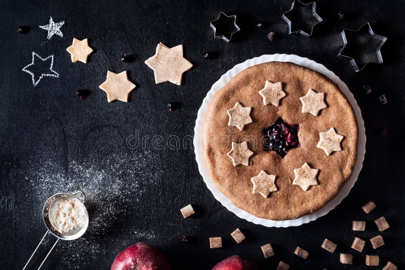 Currant apple homemade pie on black