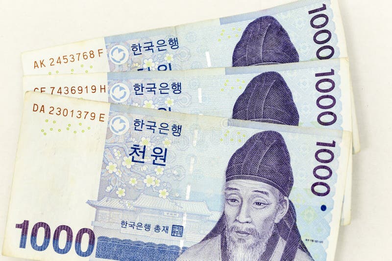Currency banknotes spread across frame korean won in various denomination royalty free stock images Currency banknotes spread across frame korean won in various denomination royalty free stock images